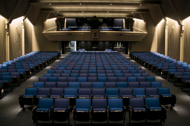 An empty Cohen Auditorium at Tufts University. Photo by Kevin Ma, courtesy of Tufts Now.
