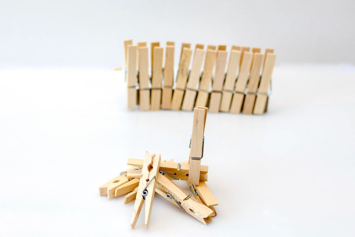 "Clothes Pins on a White Background" by wuestenigel is licensed under CC BY 2.0