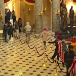 Hard right wingers casually tour the Capitol during last week's attack. Via C-SPAN.