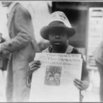 "LC-USZ62-69050 African Amercian Newspaper Boy 1921" by Children's Bureau Centennial is licensed under CC BY 2.0