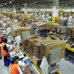 "amazon warehouse" by hnnbz is licensed under CC BY 2.0