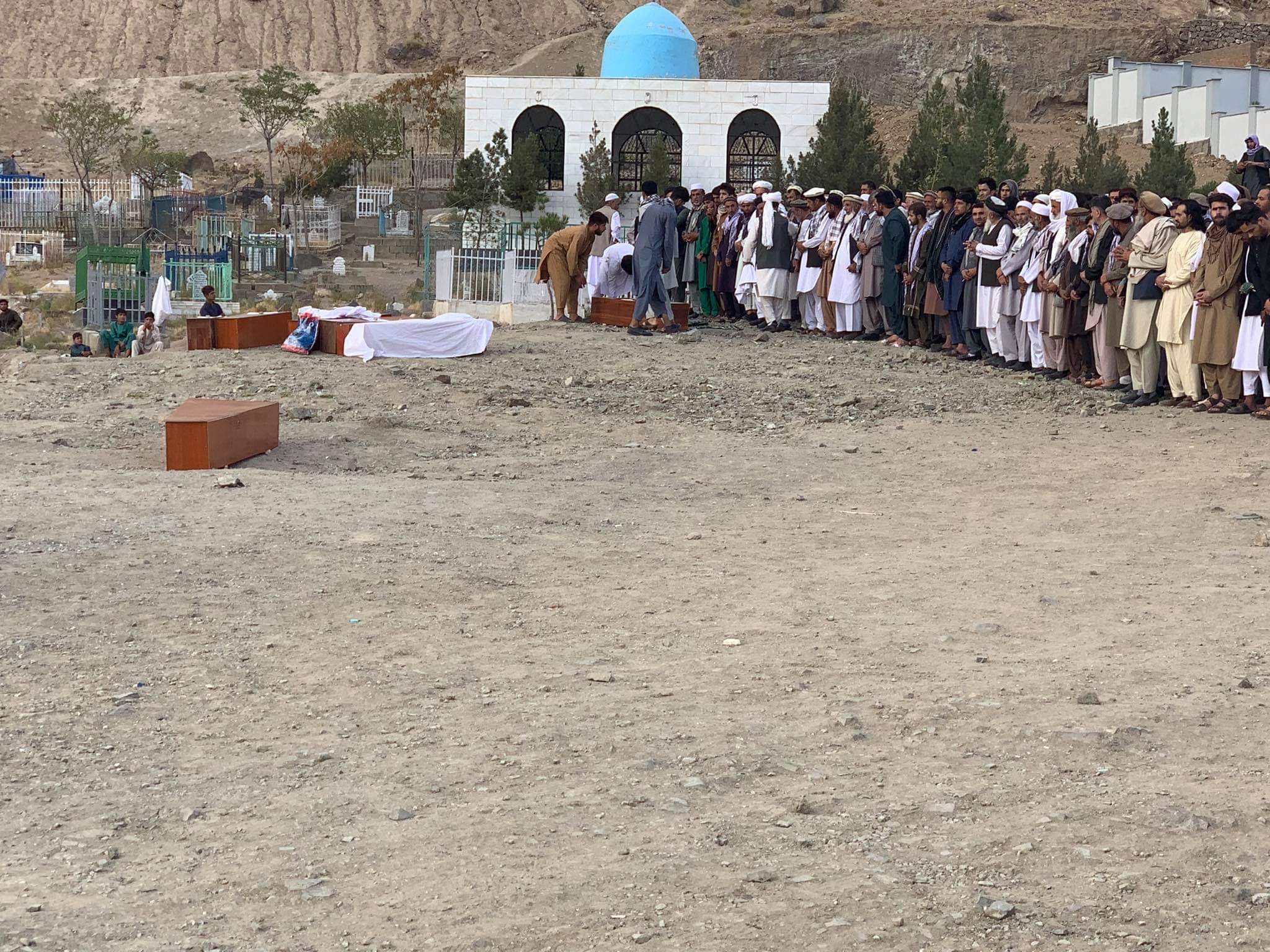 The funeral of Ezmerai Ahmadi and family