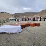 The coffins of Ezmerai Ahmadi and his family at their funeral. Photo by an Afghani present at the funeral.